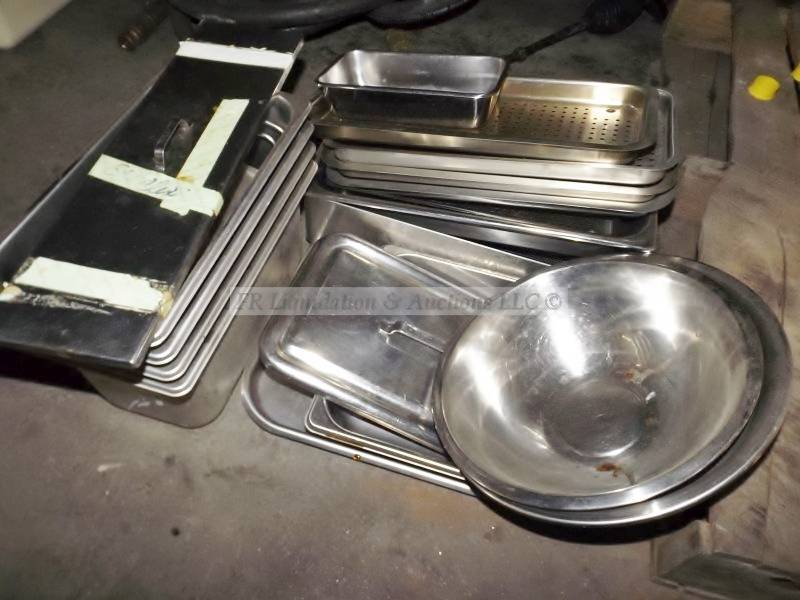 lot 129 image: Stainless steel commercial serving dishes