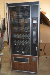 lot 1 image: Vending Machine 28.5W x 3Ft. D x 61H