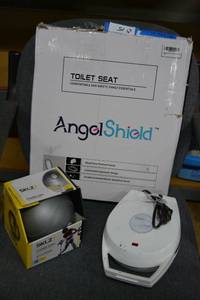 lot 15 image: Angel Shield Toilet Seat Still in Box, Skilz Power-Thru Training Ball, and Oster Belgian Waffle Maker