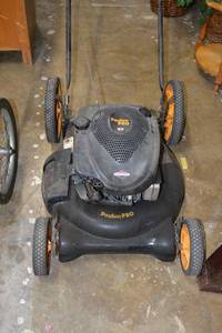 lot 33 image: Poulan Pro Lawn Mower Model 961320012.00 with Large Back Wheels - Working Condition Unknown