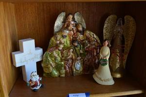 lot 46 image: Christmas Dcor Wooden Carved Manger Scene, Ceramic and Metal Angels, Cross and Resin Santa