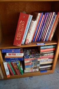 lot 49 image: CraftingSewing Books and Paperback Novels as shown