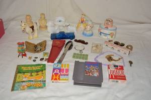 lot 89 image: Misc. Lot Girl Scouts Pins and Silverware set, Cologne Bottles and More