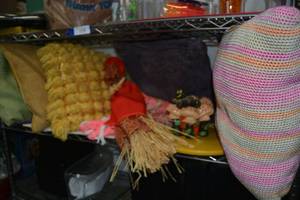 lot 115 image: Vintage Throw Pillows, Straw Figure, Mushroom Pottery Piece