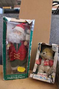 lot 57 image: Singing Elvis Bear and 2 Ft. tall Animated Santa