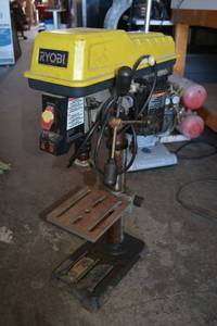 lot 14 image: Ryobi 10 Bench Drill Press with Laser Model DP103L