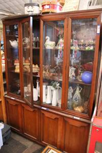 lot 75 image: Vintage Glass Front Display Cabinet by Garrison Furniture - 54W x 15D x 6Ft. Tall CONTENTS SOLD SEPARATELY