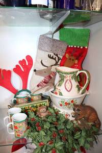 lot 95 image: Christmas Dcor Ceramic Pitcher, Ceramic Chaffing Dish with Warming Stand, Set of 4 Mugs, Serving Dish, Animal Figurines and Reindeer Stockings