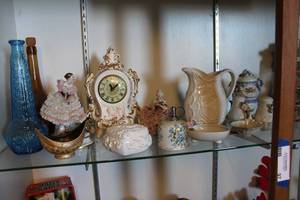 lot 97 image: Tall Colored Glass Bottles, Ceramic Desk Clock, Vintage Ceramic Plant Mister and More