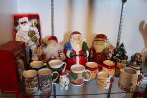lot 98 image: Christmas Santa Figurines, Collectable Santa Ornament, Cookie Jar and Coffee Mugs