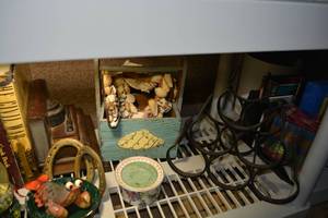 lot 307 image: Wine Rack, Shells and Horseshoe Dcor, Bookends and Books as shown