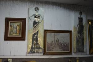 lot 313 image: Pair of Stretched Canvas Prints African Women with Gold Accents, The Landing at Cape Henry Print, and Painting Signed by artist