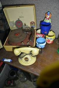 lot 311 image: Ringley Bros. Barnum & Bailey Clown Dish and Mugs, Vintage Silvertone Record Player, Perfume Bottles, and Vintage Desk Phone