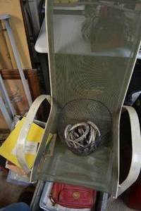 lot 360 image: Basket of Horseshoes and Patio Chair