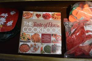 lot 115 image: The Taste of Home Cookbook, Plastic Cookie Cutters and Trays