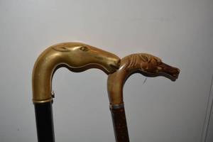 lot 140 image: Brass Horsehead Cane and Plastic Horsehead Cane
