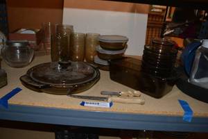 lot 191 image: Smoked Glassware Glasses, Lidded Pie Plate, Bread Loaf Glass Pan, Small Bowls and Bread Knife