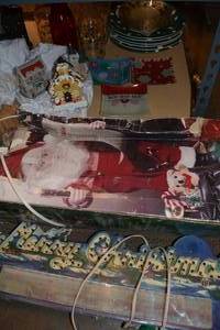 lot 193 image: Christmas Polka Dot Plates and Glasses, Santa Figurine, and Merry Christmas Sign