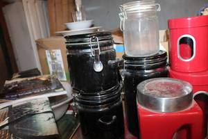 lot 438 image: Black Cannister Set, Red Cannister Set, and One Clear Cannister