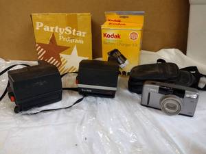 lot 162 image: Vintage Camera Polaroid, Canon, and Kodak, see pictures