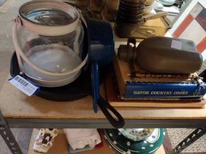 lot 158 image: Camping Lot Cast Iron Skillet, Glass Lantern, Water Bottle, Gator Cook Book