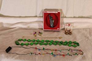 lot 258 image: Jewelry Holiday theme jewelry and pewter Statue of Liberty USA made ornament