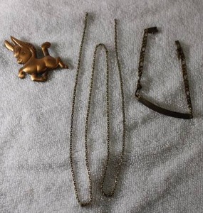 lot 248 image: Jewelry Vintage copper Donkey pinbrooch, bracelet 8L and 26 necklace (no clasp)
