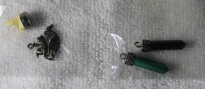 lot 226 image: Jewelry Sterling Silver Noahs Ark pendantcharm. Marked 925, Silver tooth filling and (2) gemstone pendants - Malachite and Black Onyx