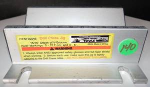 lot 140 image: Harbor Freight Tools Self-Centering Drill Press Jig  Item 92046