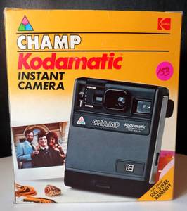 lot 153 image: Vintage Kodak Champ Kodamatic Instant Camera in Original Box