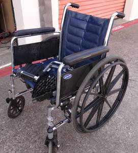 lot 277 image: INVACARE WHEELCHAIR WITH FOOT REST - VG CONDITION