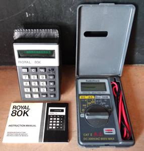 lot 304 image: Royal 80K Vintage Calculator with Case & Radioshack Digital Multimeter