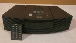 lot 37 image: BOSE WAVE RADIOCD MODEL AWRC1G WITH REMOTE IN COLOR AS SHOWN.