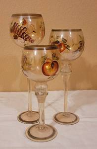lot 47 image: LOT OF 3 STEMMED GLASS CANDLE HOLDERS IN STYLE SHOWN.