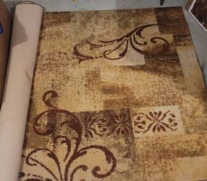 lot 89 image: 96 x 60 AREA RUG IN STYLE AND DESIGN SHOWN.