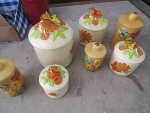 lot 53 image: set of 3 yellow butterfly canisters- set of 4 off white butterfly canisters all come with kids great shape