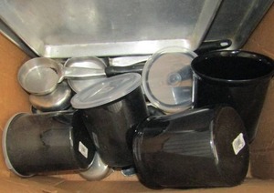 lot 54 image: set of 4 black Carlisle plastic canisters with lids, set of black handled ladles spoons, & - 4 metal baking cookie sheets