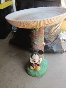 lot 59 image: rubber mickey mouse tree bird bath, 20 12 tall by 17 diameter