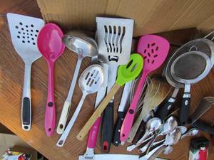 lot 129 image: Kitchen silverware lot includes, cooking utensils and eating utensils, spatulas, spoons, littles, strainers and more
