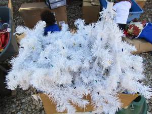 lot 134 image: pre lit white 4ft Christmas tree with green stand