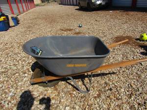 lot 156 image: True temper wheel barrel, has a flat tire but in good shape otherwise