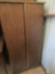 lot 32 image: 5426 1213  4 tier book shelf with 2 front door to hide away items good condition