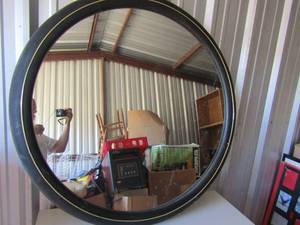 lot 40 image: 38 in diameter oval black frame wall mirror