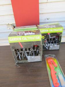 lot 15 image: 3 brand new garden cultivators and a new line cutter in the package