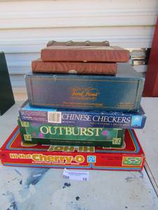 lot 16 image: Game lot includes, trivial pursuit, out burst, Hi-Ho cherry-O, Chinese checkers, 3 sets of dominoes