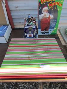 lot 182 image: Rocking Santa, gift boxes, bags, snowman covered glass cookie jar