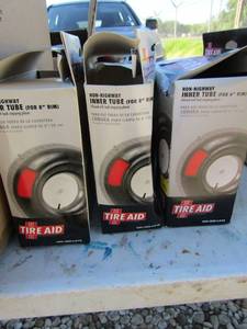 lot 195 image: Tire aid inner tube for a 6 rim qty 3 unknown if new are used, seem to be new in pack just damaged package