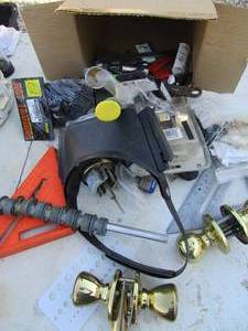 lot 201 image: Box of tools, include hammers, screw drivers, welding glasses, plyers, door knobs and locks most have keys, wrenches and more