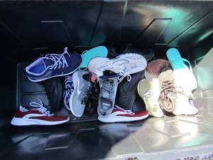 lot 243 image: Used lot of womens tennis shoes size 9 & 9 12 includes, red and black Jordons, black no slip work shoes, grey and maroon shoes, and more