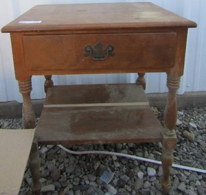 lot 255 image: Ethan Allen American traditional solid maple and her birch one draw side table has a bottom shelf but its broke in half